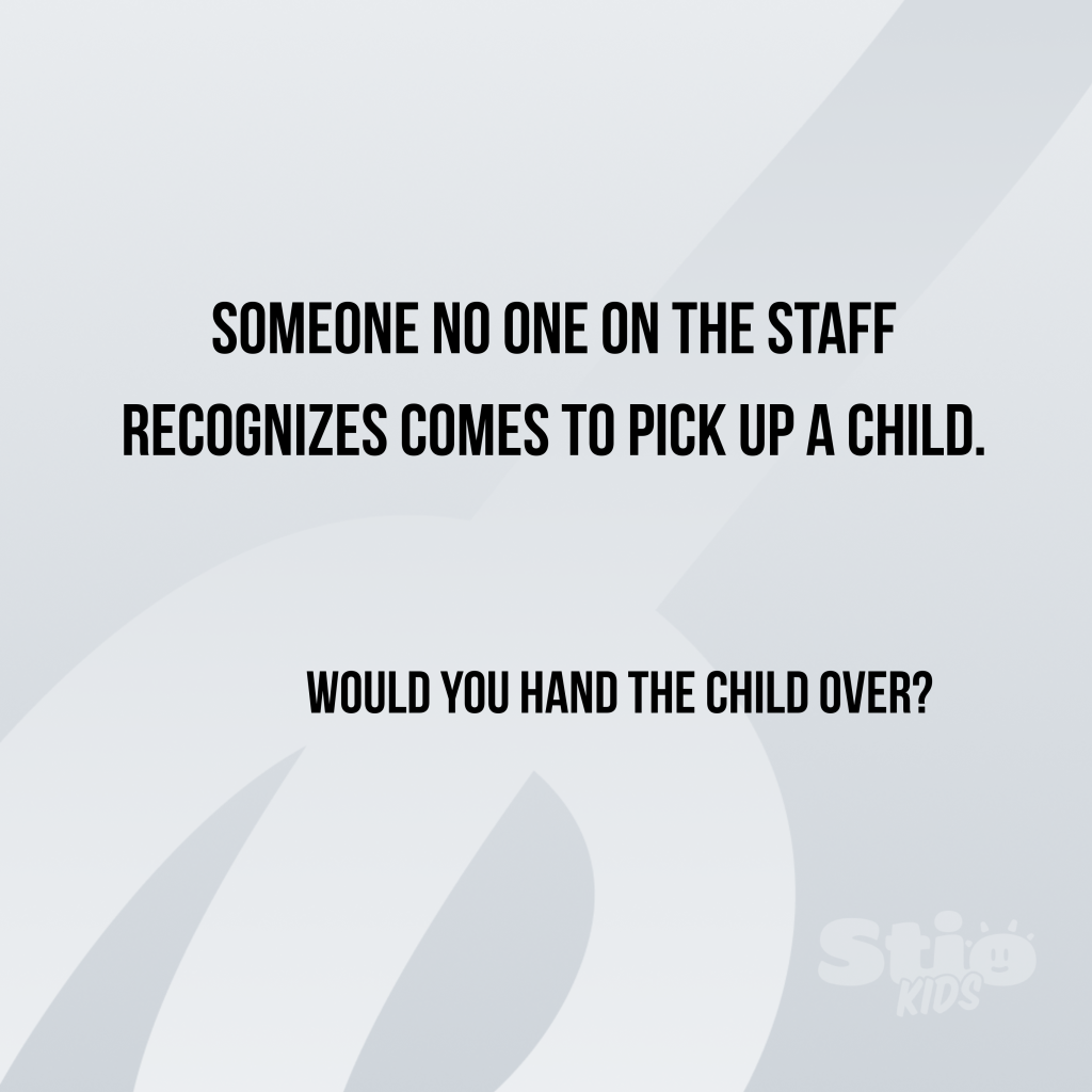 Educator verifying authorization for child pickup using the STIOKids daycare safety system.
